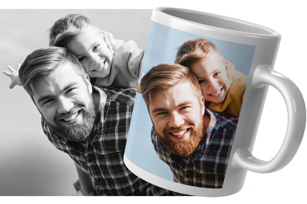 Cheerful bearded father having fun with his little son